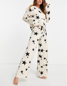 Пижамный комплект из топа с длинными рукавами и широких брюк из вискозы с принтом звезд бежевого и черного цветов в подарочном мешочке ASOS DESIGN-Разноцветный