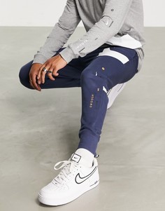 Темно-синие джоггеры с манжетами Nike Swoosh-Темно-синий