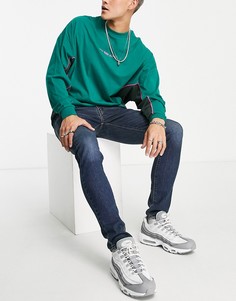 Облегающие суженные книзу джинсы темно-синего цвета Levis-Темно-синий Levis®