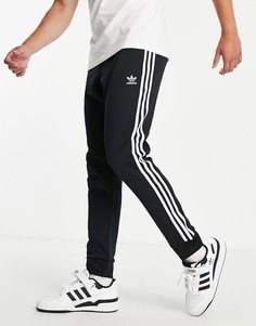 Купить мужские джоггеры Adidas Originals в интернет-магазине Lookbuck