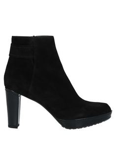 Полусапоги и высокие ботинки Stuart Weitzman
