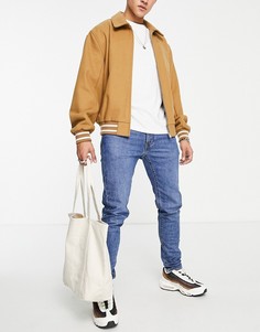 Голубые суженные книзу джинсы зауженного кроя Levis-Голубой Levis®