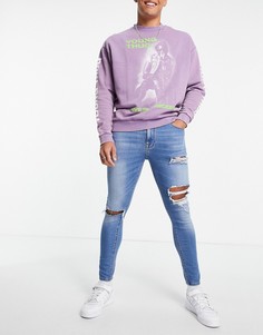 Выбеленные суперэластичные джинсы с сильными разрывами на коленях и напылением ASOS DESIGN-Голубой