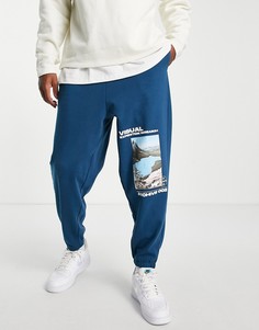 Oversized-джоггеры голубого цвета с принтами горных видов от комплекта ASOS DESIGN-Голубой