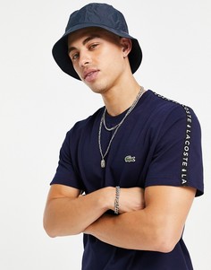 Темно-синяя футболка с декоративными лентами на рукавах Lacoste-Темно-синий
