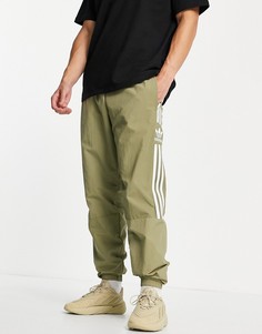 Джоггеры цвета хаки adidas Originals adicolor Lock Up-Зеленый цвет