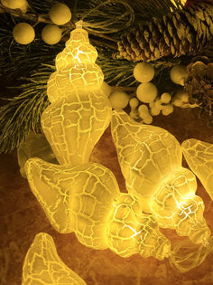 Световая гирлянда новогодняя Qvatra Matte LED Shells yellow 5 м белый теплый