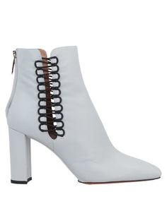 Полусапоги и высокие ботинки Santoni