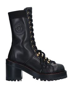 Полусапоги и высокие ботинки Versace