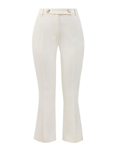 Кремовые брюки из ткани Crepe Couture с шипами-пирамидами Valentino