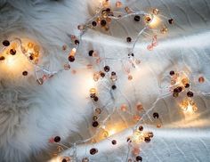 Световая гирлянда новогодняя Kaemingk Цветные бусинки mor 1017634 1,5 м белый теплый