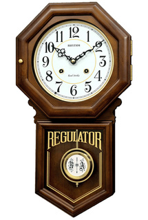 Кварцевые музыкальные настенные часы с маятником и боем Rhythm CMJ586NR06