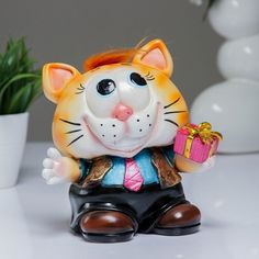 Копилка Котик с подарком, рыжий Ремеко
