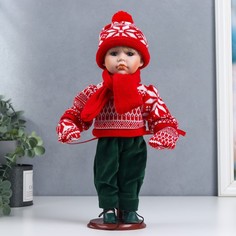 Кукла керамика, Паша в красном зимнем свитере, шапке и шарфе 30 см No Brand