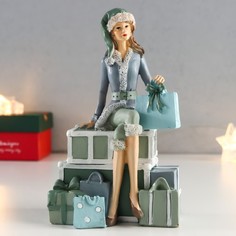 Сувенир полистоун "Девушка в костюме санты на горе подарков" 18х7,5х11 см No Brand