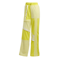 Спортивные брюки женские Adidas FS6496 желтые 32