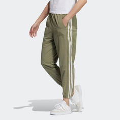Спортивные брюки женские Adidas H18600 зеленые 46
