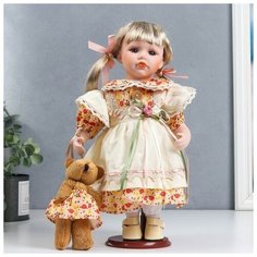 Кукла коллекционная керамика "Иришка в бежево-оранжевом платье с цветами и мишкой" 30 см Noname
