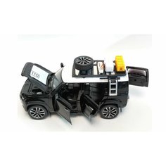 Машинка металлическая инерционная Land Rover Defenderс клаксоном 1:24, свет, звук, цвет черный XLG