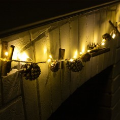 Световая гирлянда новогодняя Luazon lighting Нить шишки 7648907 1,5м белый теплый