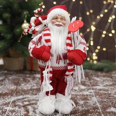 Новогодняя фигурка Зимнее волшебство Дед Мороз в вязаном костюме с лыжами 3555418 1 шт.