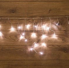 Гирлянда светодиодная "Бахрома" 3*0,8 м 200 LED белые, прозрачный ПВХ {255-065} Neon Night