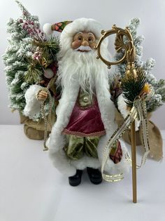 Фигурка новогодняя Merry Christmas Дед Мороз в зеленой шубе с посохом в руке 45х25