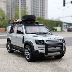 Машинка металлическая Элемент Land Rover Defender 1:24