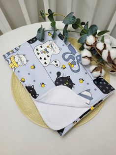 Пеленка непромокаемая "Коты с желтым" 70*100см No Brand