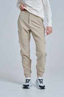Спортивные брюки женские Anta OUTDOORS A-KIND FLEECE TECH/WATER RESISTANT бежевые S
