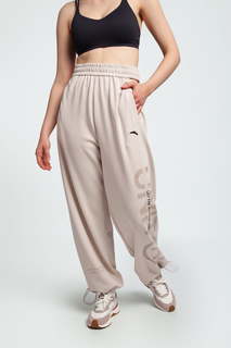 Спортивные брюки женские Anta Dance ECOCOZY 862338321 бежевые M