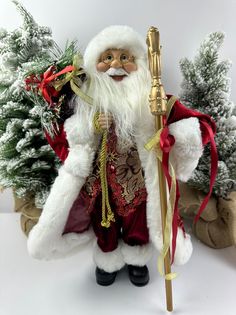 Фигурка новогодняя Merry Christmas Дед Мороз в красной шубе с посохом в руке 45х25