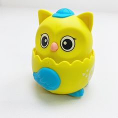 Развивающая игрушка Сова заводная, желтая No Brand