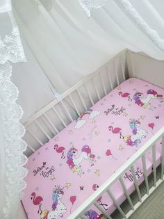 Простынь на резинке на матрас "Единороги на розовом" 120*60см No Brand