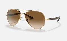 Солнцезащитные очки унисекс Ray-Ban RB3675 коричневые