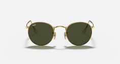 Солнцезащитные очки унисекс Ray-Ban RB3447N золотые/коричневые