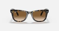 Солнцезащитные очки унисекс Ray-Ban RB4105 коричневые2