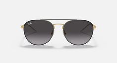 Солнцезащитные очки унисекс Ray-Ban RB3589 золотые/серые