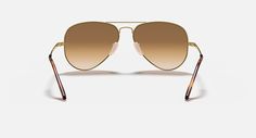 Солнцезащитные очки унисекс Ray-Ban RB3689 золотые/коричневые