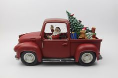 Новогодний сувенир LED WDL-22015 Дед Мороз на машине собака и ёлочка в кузове 33х16х23см