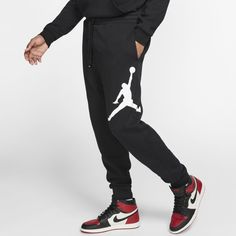 Спортивные брюки мужские Nike M J JUMPMAN LOGO FLC PANT черные L