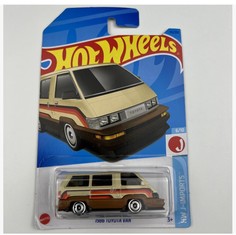 Машинка базовой коллекции Hot Wheels 67 JEEPSTER COMMANDO хаки 5785/HKJ02