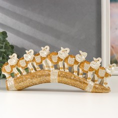 Сувенир полистоун "Семь белых слонов в золотых попонах на резном бивне" 11х3,5х28,5 см No Brand