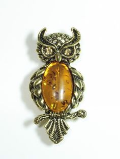 Брошь из латуни с янтарем T&Z_Mineral 400/7