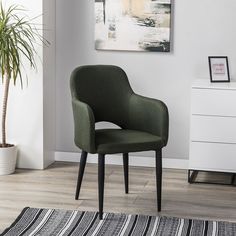 Кресло Helvant Ladge темно-зеленый на черных ножках