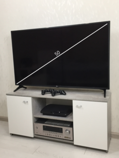 Тумба под телевизор Антресоль Смайл ТТ-01 111х34х51 см Цемент светлый/Белый Шагрень