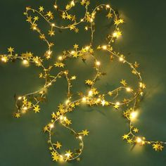 Гирлянда нить росы медь "Золотые звезды" 5 м СНОУ БУМ, 50 LED, свечение шампань, 3хАА