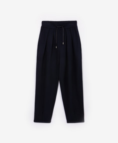 Брюки трикотажные зауженные с манжетами синие для девочки Gulliver (164)