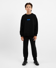 Брюки-джоггеры трикотажные с принтом чёрные для мальчика Gulliver, 152, 22412BJC5601