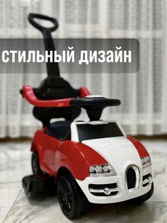 Каталка-машина толокар с рулем и ручкой красный No Brand